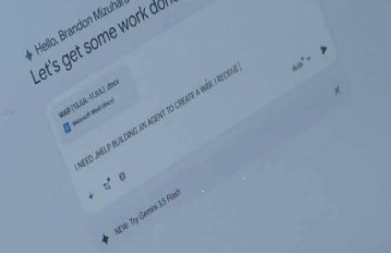An enhanced crop of a laptop screen from one of the published photographs, showing an AI chat window with a Word attachment named WAR (13-JUL - 17-JUL).docx sitting above a typed prompt reading I NEED HELP BUILDING AN AGENT TO CREATE A WAR